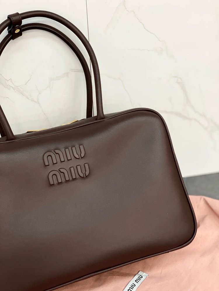 miumiu Original Leather Handheld Official Document Bag for Women 2025 New Large Capacity Retro Underarm Shoulder Bag
