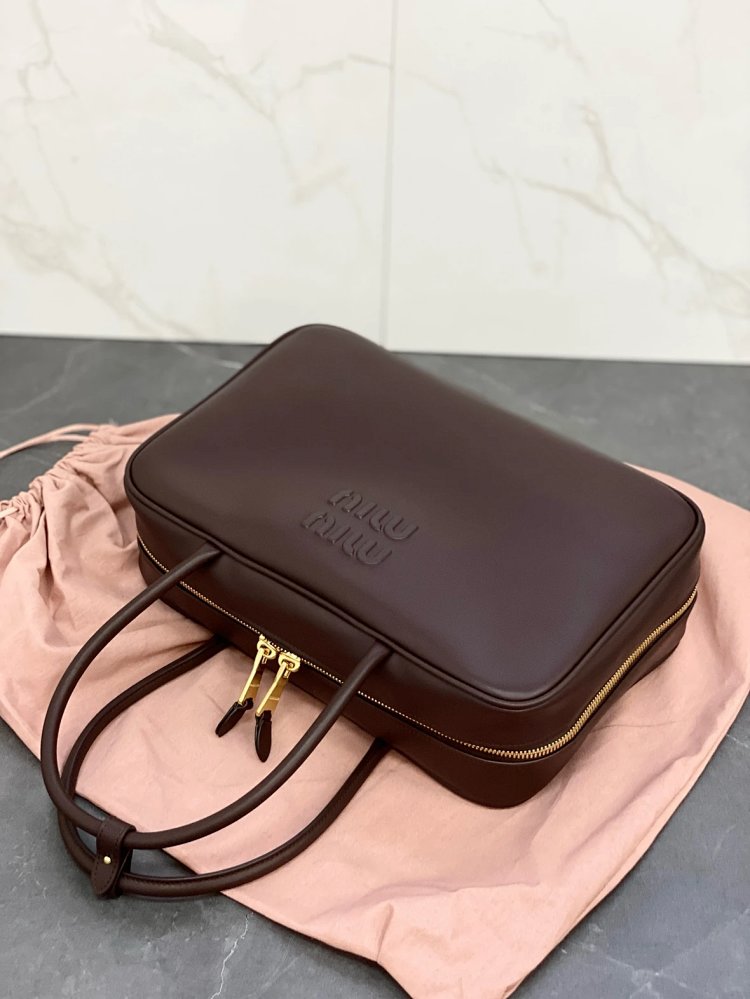 miumiu Original Leather Handheld Official Document Bag for Women 2025 New Large Capacity Retro Underarm Shoulder Bag