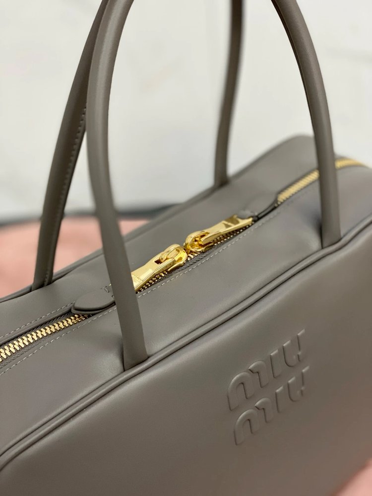 miumiu Original Leather Handheld Official Document Bag for Women 2025 New Large Capacity Retro Underarm Shoulder Bag