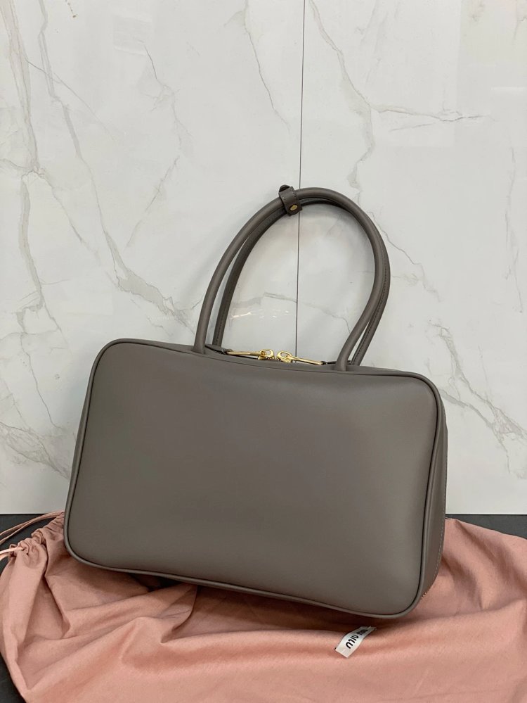 miumiu Original Leather Handheld Official Document Bag for Women 2025 New Large Capacity Retro Underarm Shoulder Bag