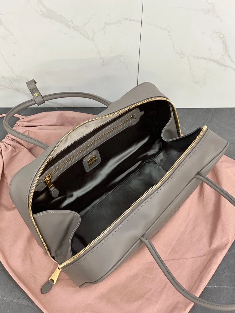 miumiu Original Leather Handheld Official Document Bag for Women 2025 New Large Capacity Retro Underarm Shoulder Bag