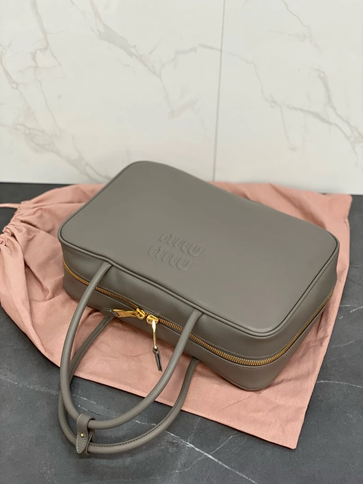 miumiu Original Leather Handheld Official Document Bag for Women 2025 New Large Capacity Retro Underarm Shoulder Bag