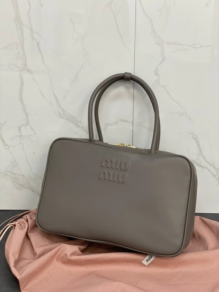 miumiu Original Leather Handheld Official Document Bag for Women 2025 New Large Capacity Retro Underarm Shoulder Bag