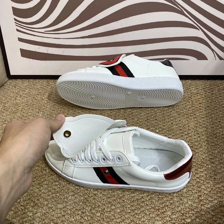 Gucci kisses red lips in white shoes