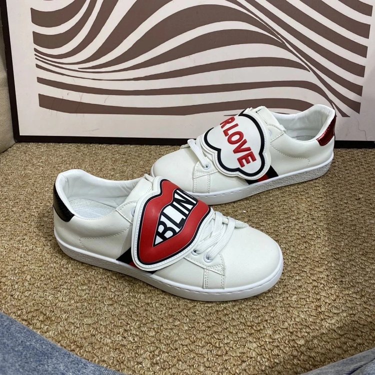 Gucci kisses red lips in white shoes