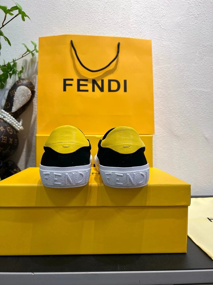 Fendi Monster stomps on board shoes with one foot