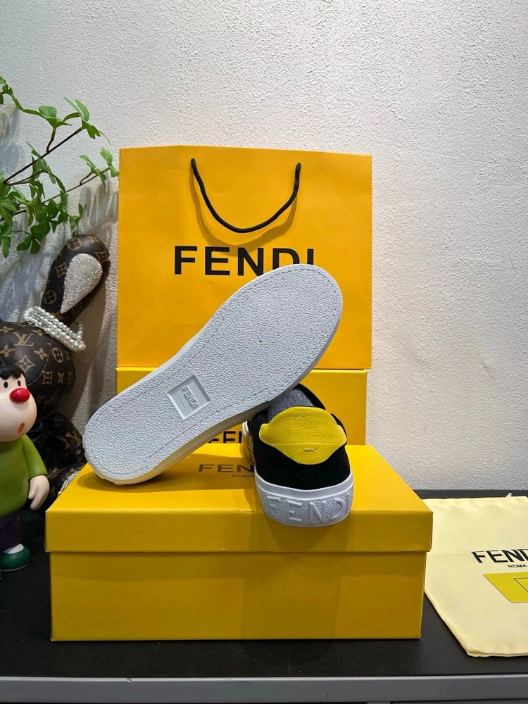 Fendi Monster stomps on board shoes with one foot
