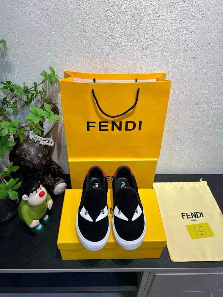 Fendi Monster stomps on board shoes with one foot