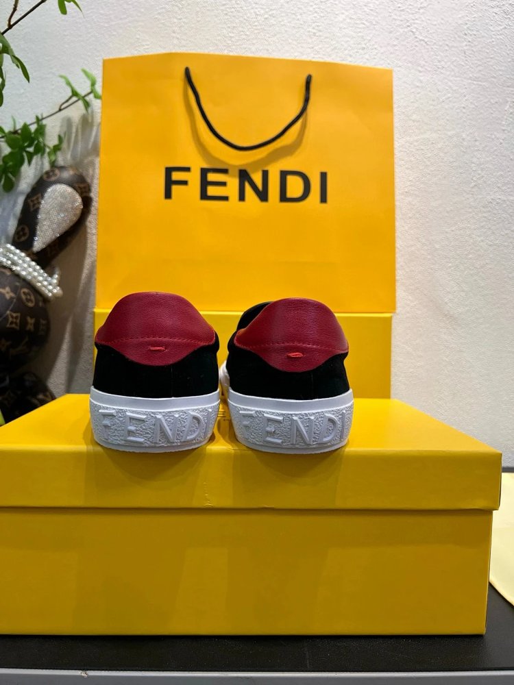 Fendi Monster stomps on board shoes with one foot