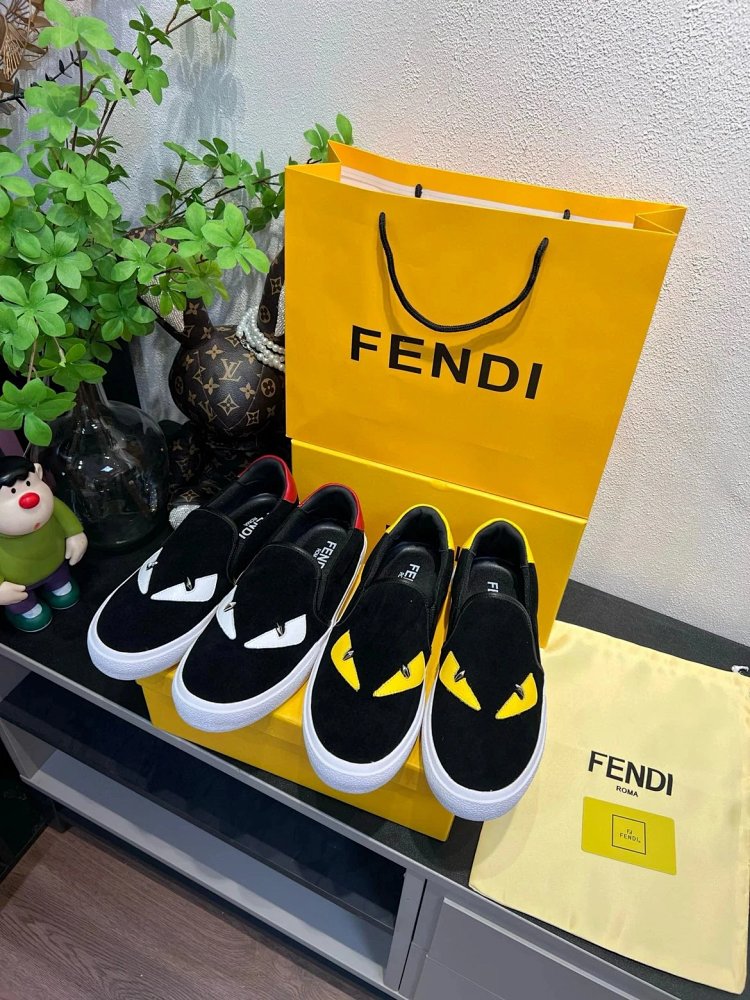 Fendi Monster stomps on board shoes with one foot