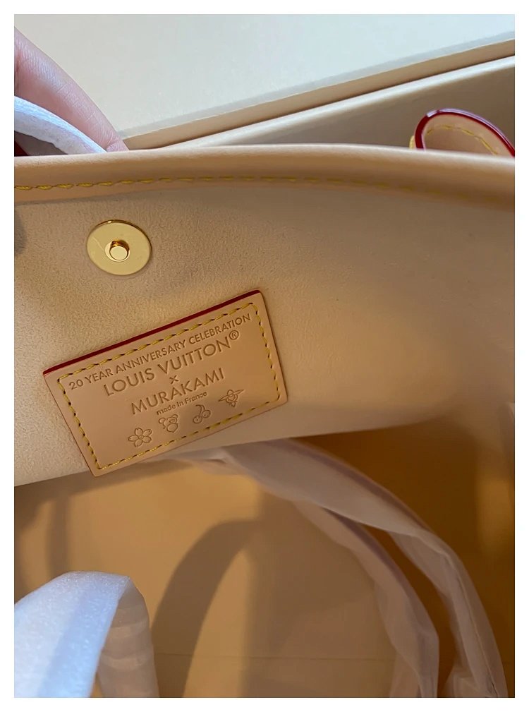 Louis Vuitton white tri colored CarryAll handbag
