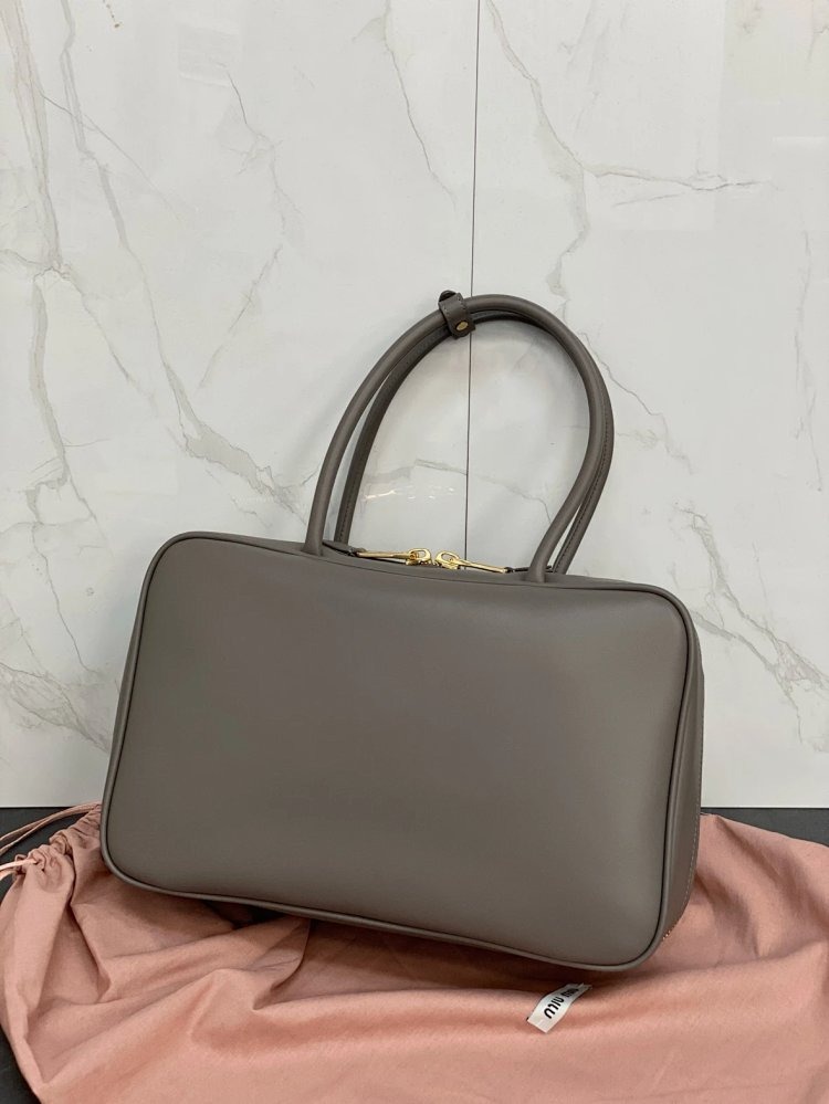 miumiu Original Leather Handheld Official Document Bag for Women 2025 New Large Capacity Retro Underarm Shoulder Bag
