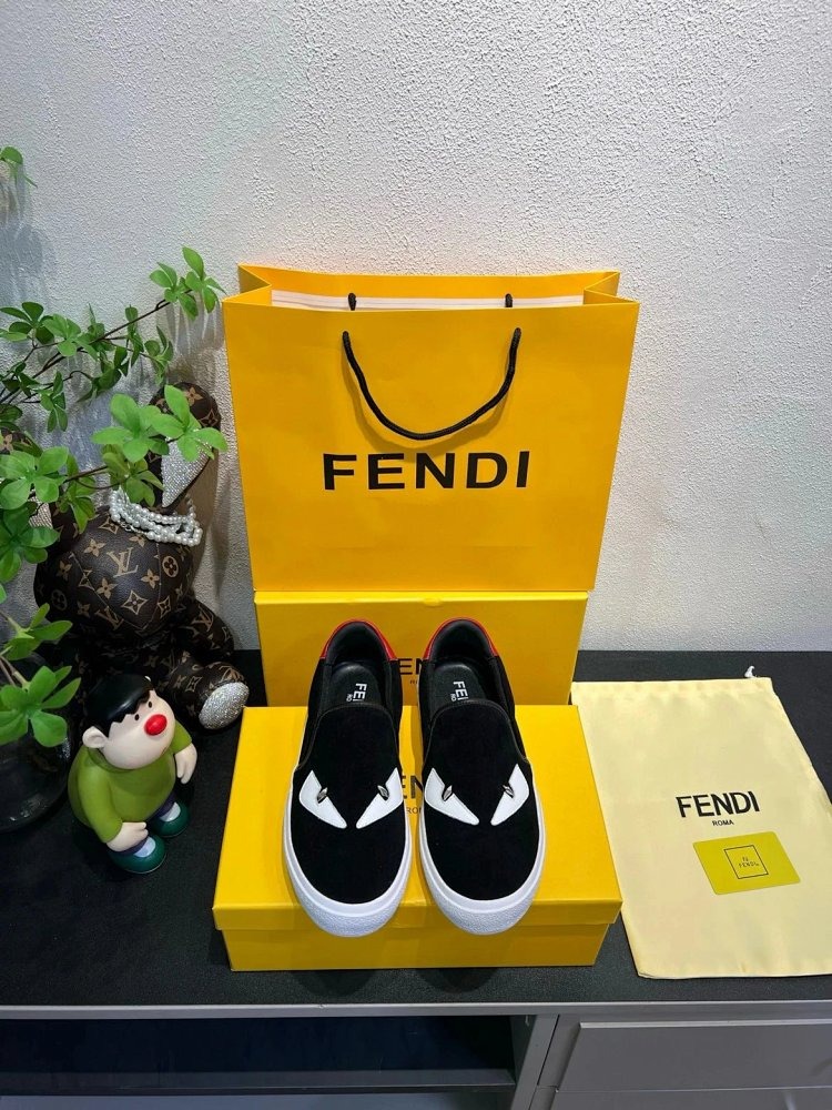 Fendi Monster stomps on board shoes with one foot