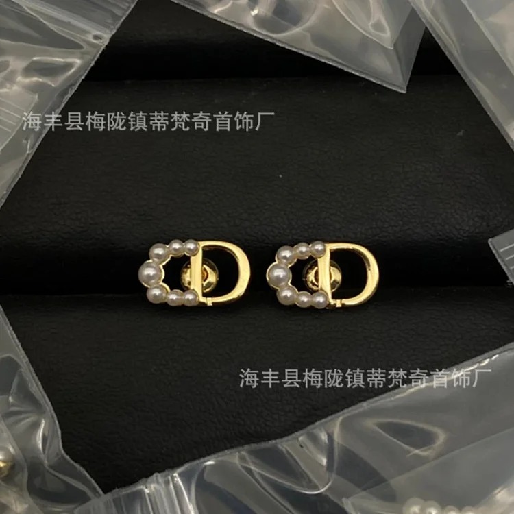 25 early spring Dijia/Djia earrings big and small pearl stars pig nose CD earrings new temperament bow earrings