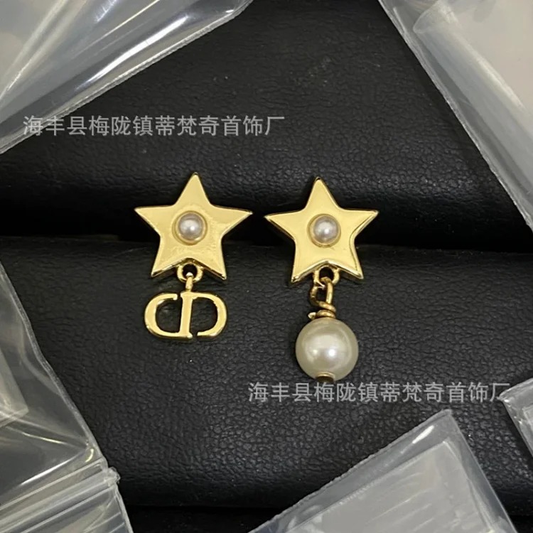25 early spring Dijia/Djia earrings big and small pearl stars pig nose CD earrings new temperament bow earrings